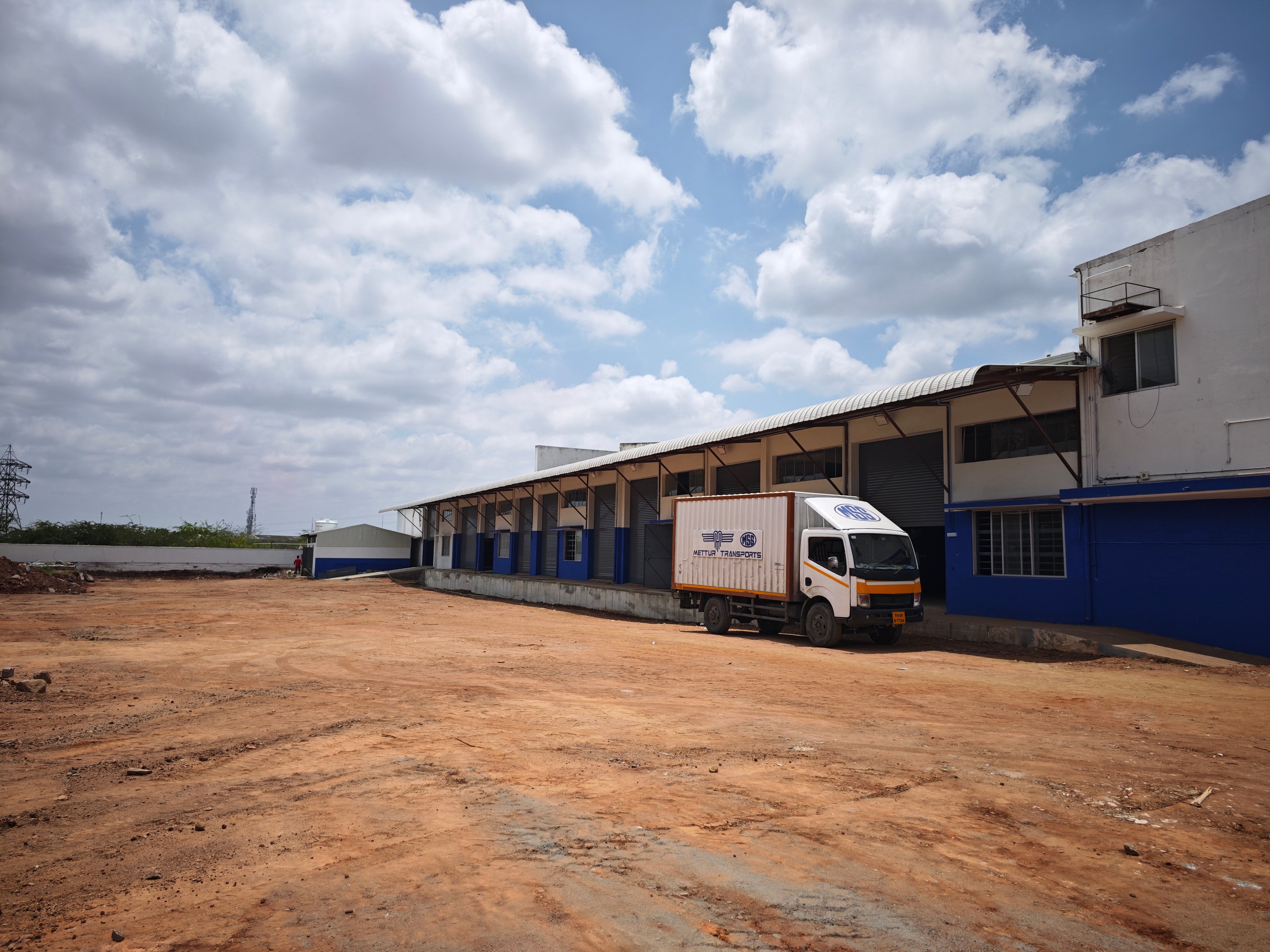 Mettur Transports warehouse and delivery vehicle